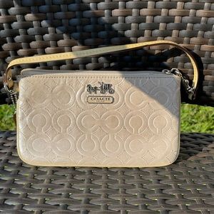 Tan coach wristlet